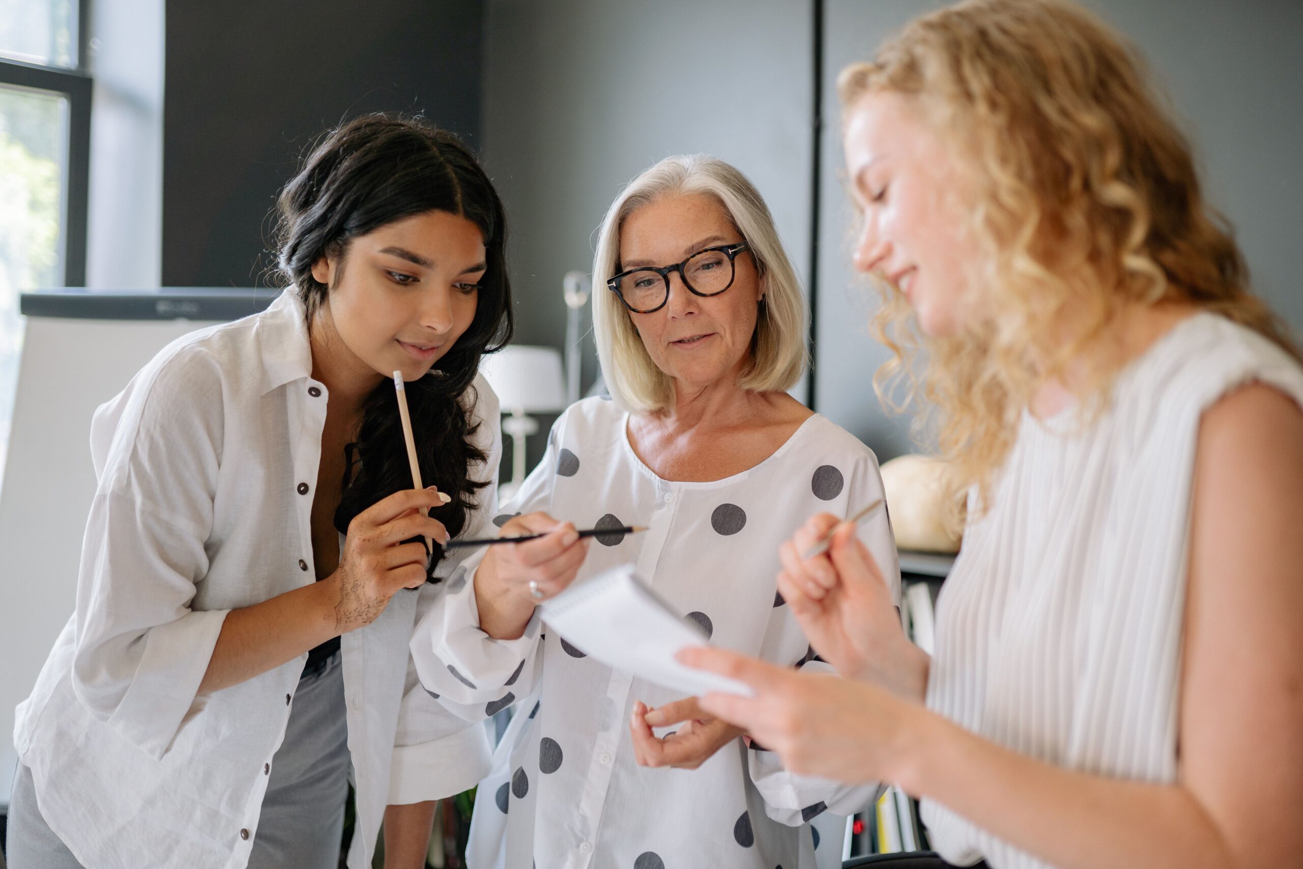 3 ladies working together in a community patnership